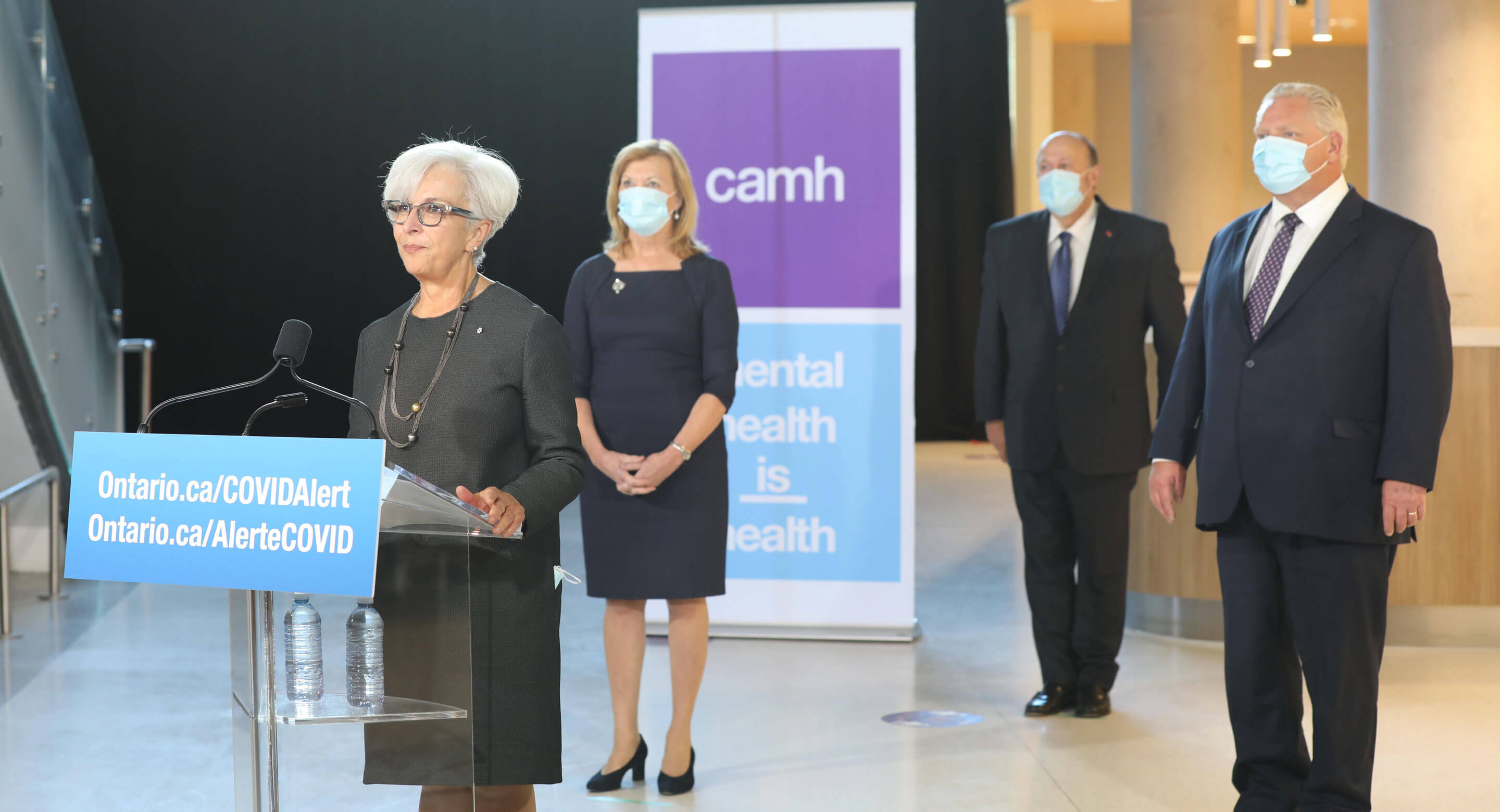 Dr. Catherine Zahn speaking during the Queen Street Redevelopment Phase 1C ribbon-cutting event